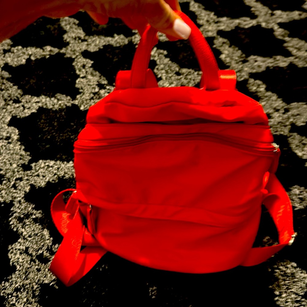 RED NYLON BACKPACK